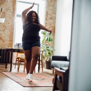 Lady dancing in living room